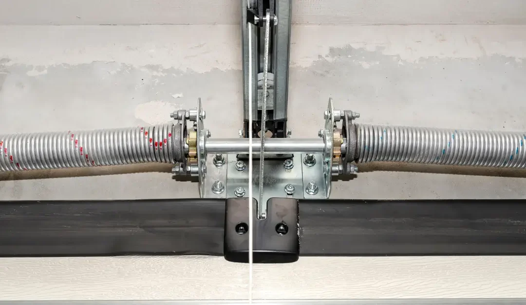 Torsion Springs vs Extension Springs: What’s on Your Garage Door and Why It Matters