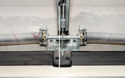 Torsion Springs vs Extension Springs: What’s on Your Garage Door and Why It Matters